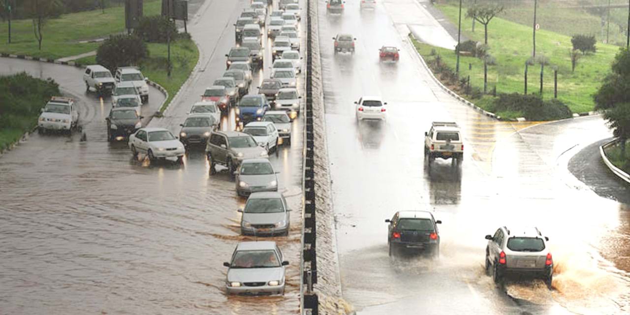Cars in flooded road